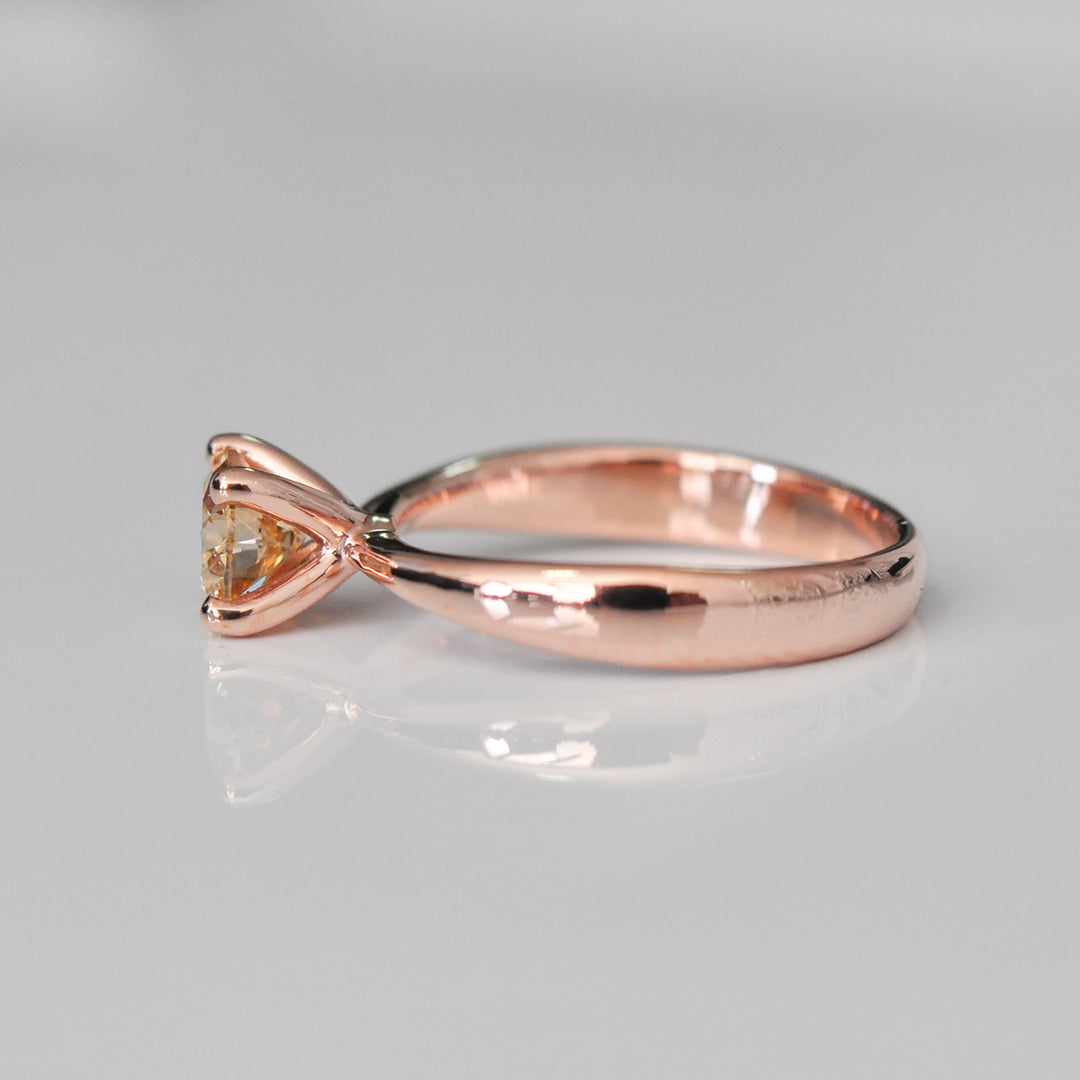 0.5 ct brown diamond Wide to thin shank 4 prongs solitaire.
