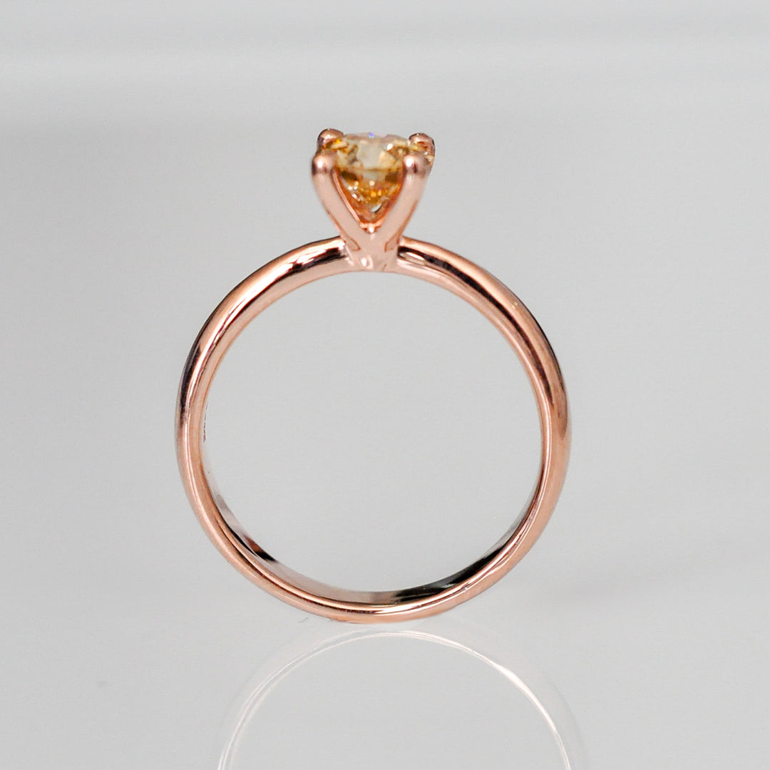 0.5 ct brown diamond Wide to thin shank 4 prongs solitaire.
