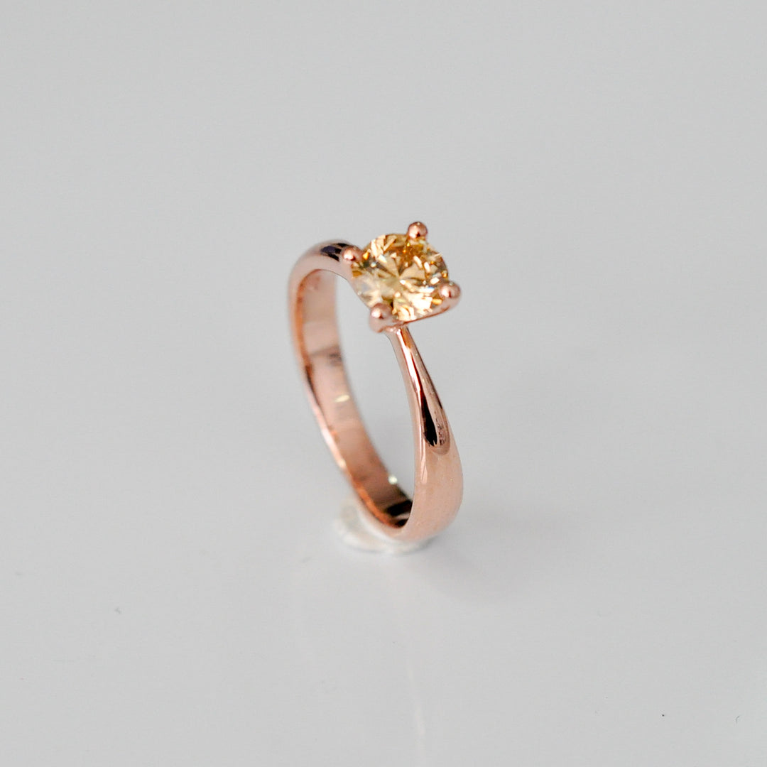 0.5 ct brown diamond Wide to thin shank 4 prongs solitaire.