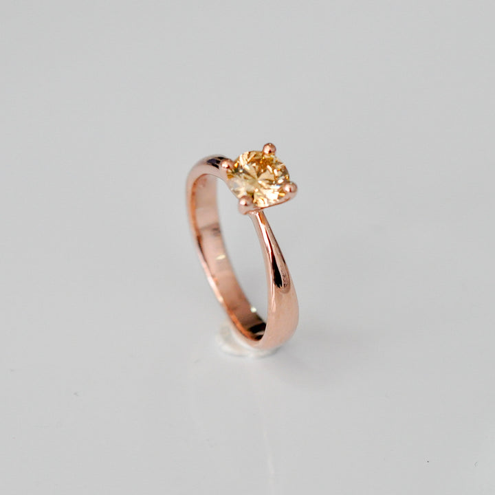 0.5 ct brown diamond Wide to thin shank 4 prongs solitaire.