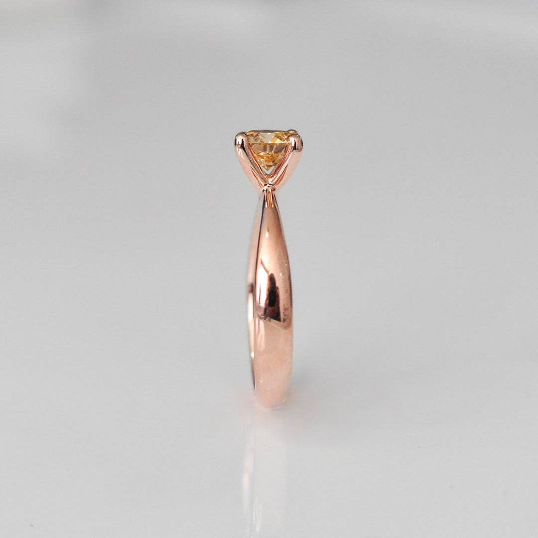 0.5 ct brown diamond Wide to thin shank 4 prongs solitaire.