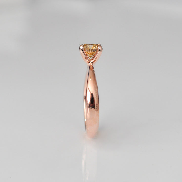 0.5 ct brown diamond Wide to thin shank 4 prongs solitaire.