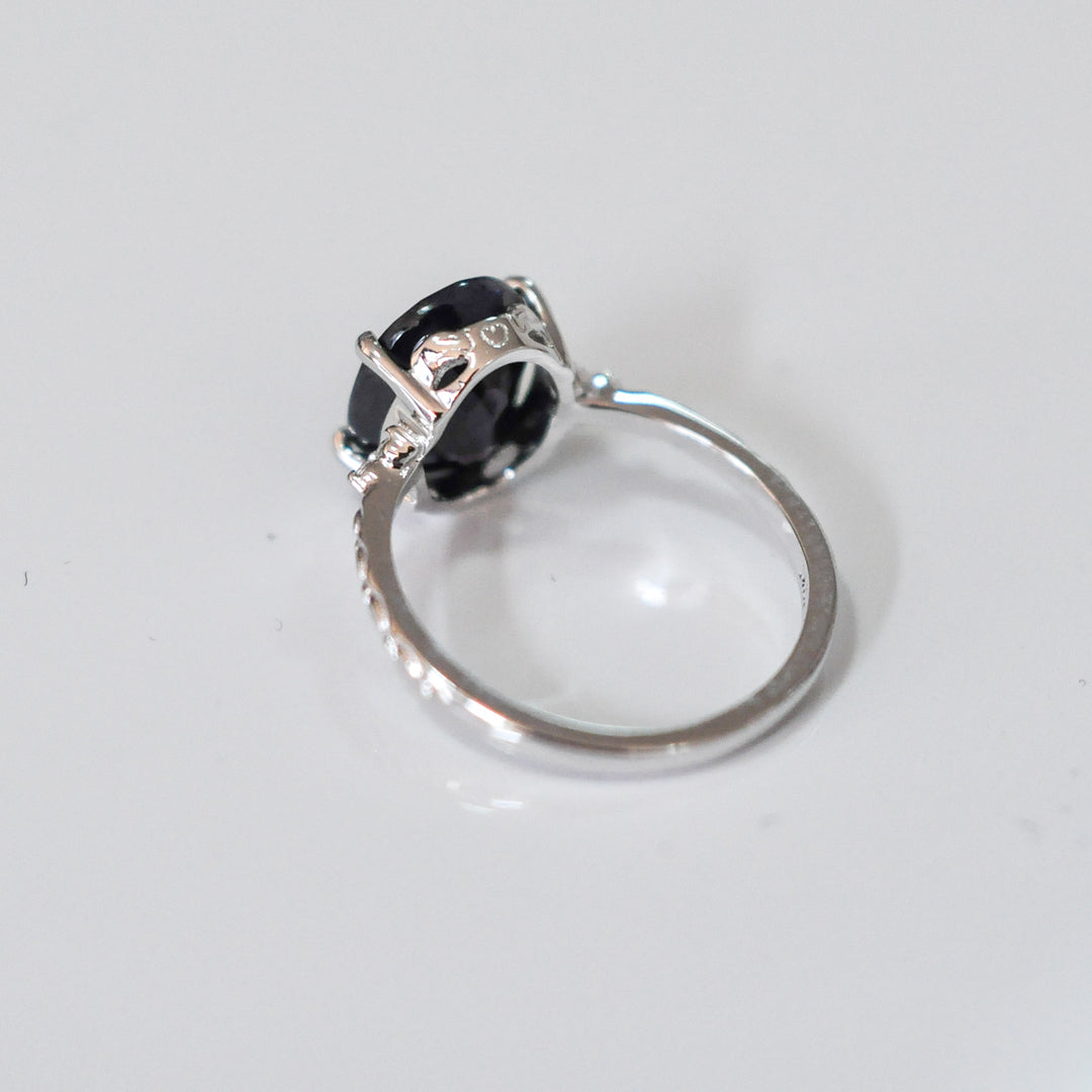 Oval Black Sapphire and side diamonds ring