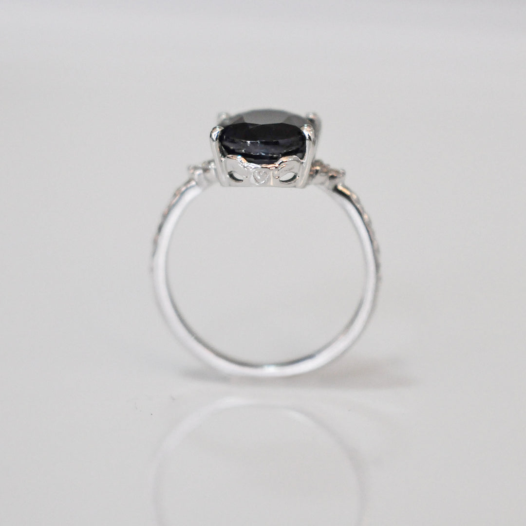 Oval Black Sapphire and side diamonds ring