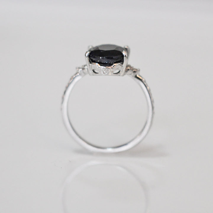 Oval Black Sapphire and side diamonds ring