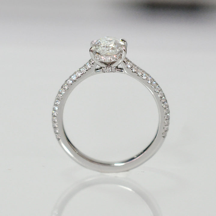 PAVE OVAL AND WHITE DIAMONDS ENGAGEMENT RING