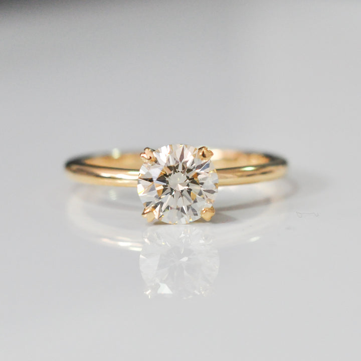 four prongs 1.5 carat diamond solitaire engagement ring