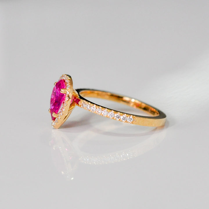 pear shape pinkish ruby halo ring