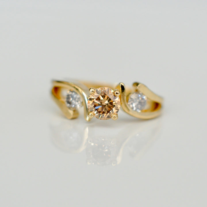 Fancy color diamond with yellow gold ring