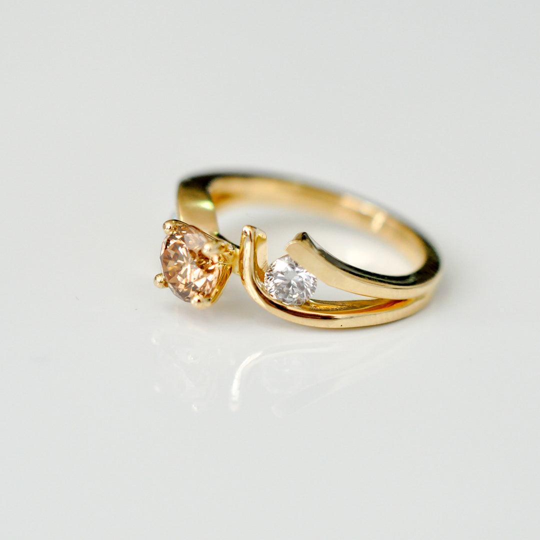 Fancy color diamond with yellow gold ring