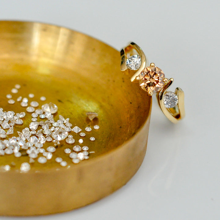 Fancy color diamond with yellow gold ring