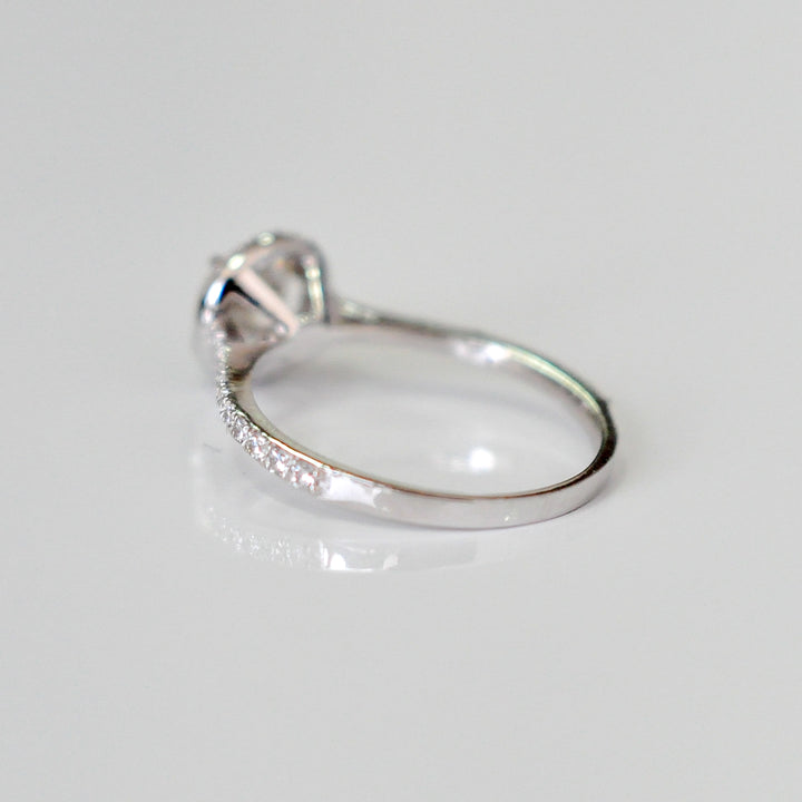 white diamonds (~1 ct. tw.) halo engagement ring