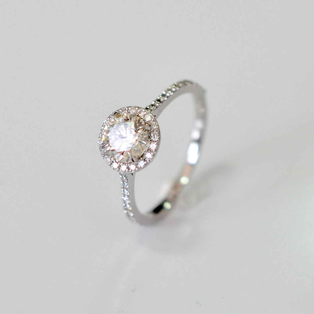 white diamonds (~1 ct. tw.) halo engagement ring