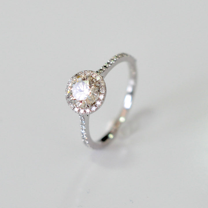 white diamonds (~1 ct. tw.) halo engagement ring