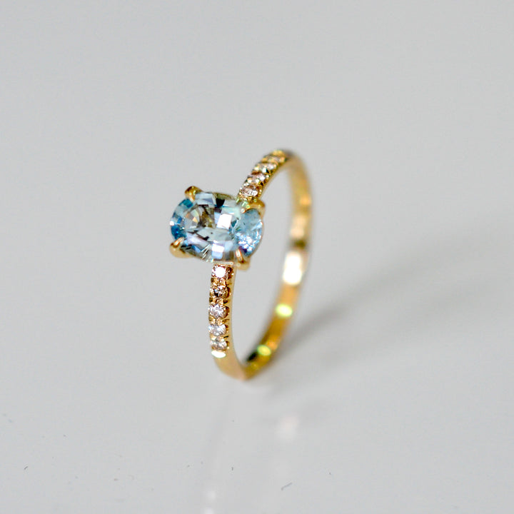 Oval aquamarine and white diamonds ring
