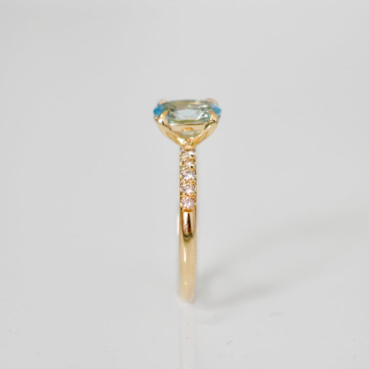 Oval aquamarine and white diamonds ring