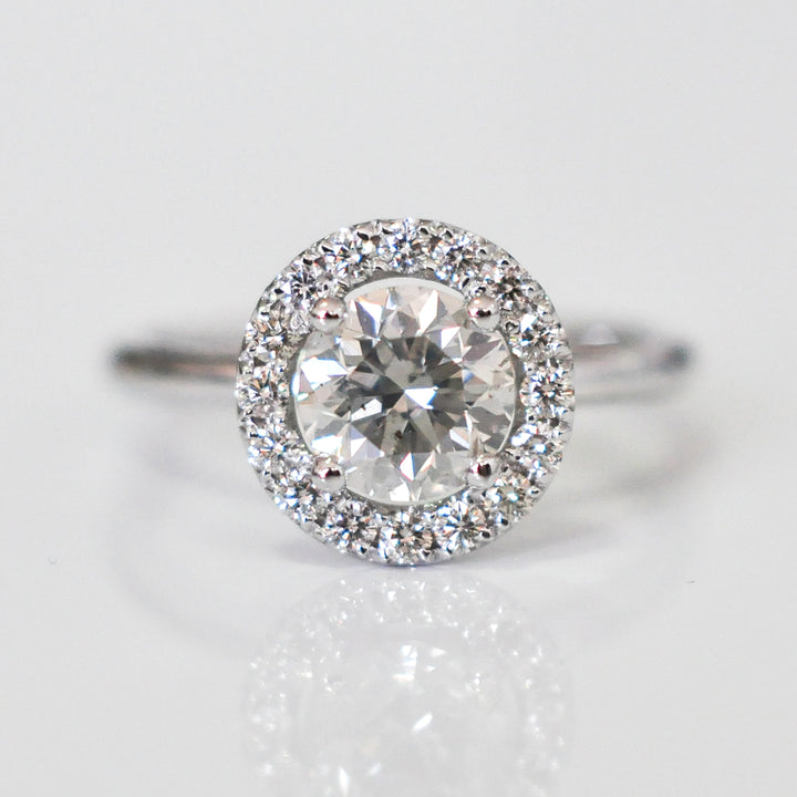 white diamonds (~1.5 ct. tw.) halo engagement ring