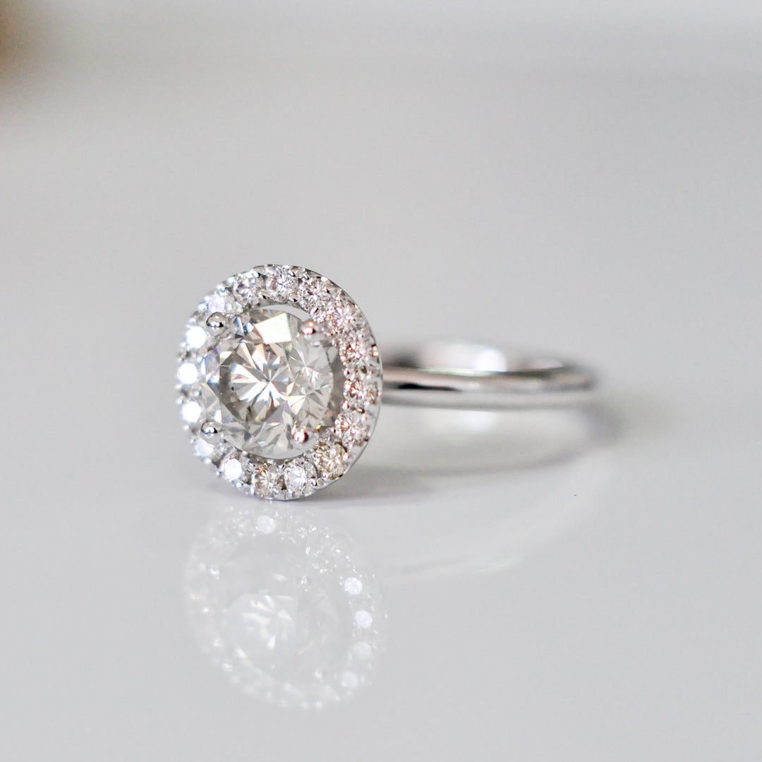 white diamonds (~1.5 ct. tw.) halo engagement ring