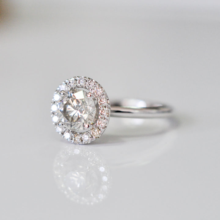 white diamonds (~1.5 ct. tw.) halo engagement ring