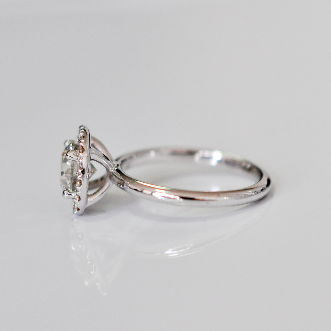 white diamonds (~1.5 ct. tw.) halo engagement ring