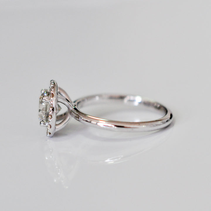 white diamonds (~1.5 ct. tw.) halo engagement ring