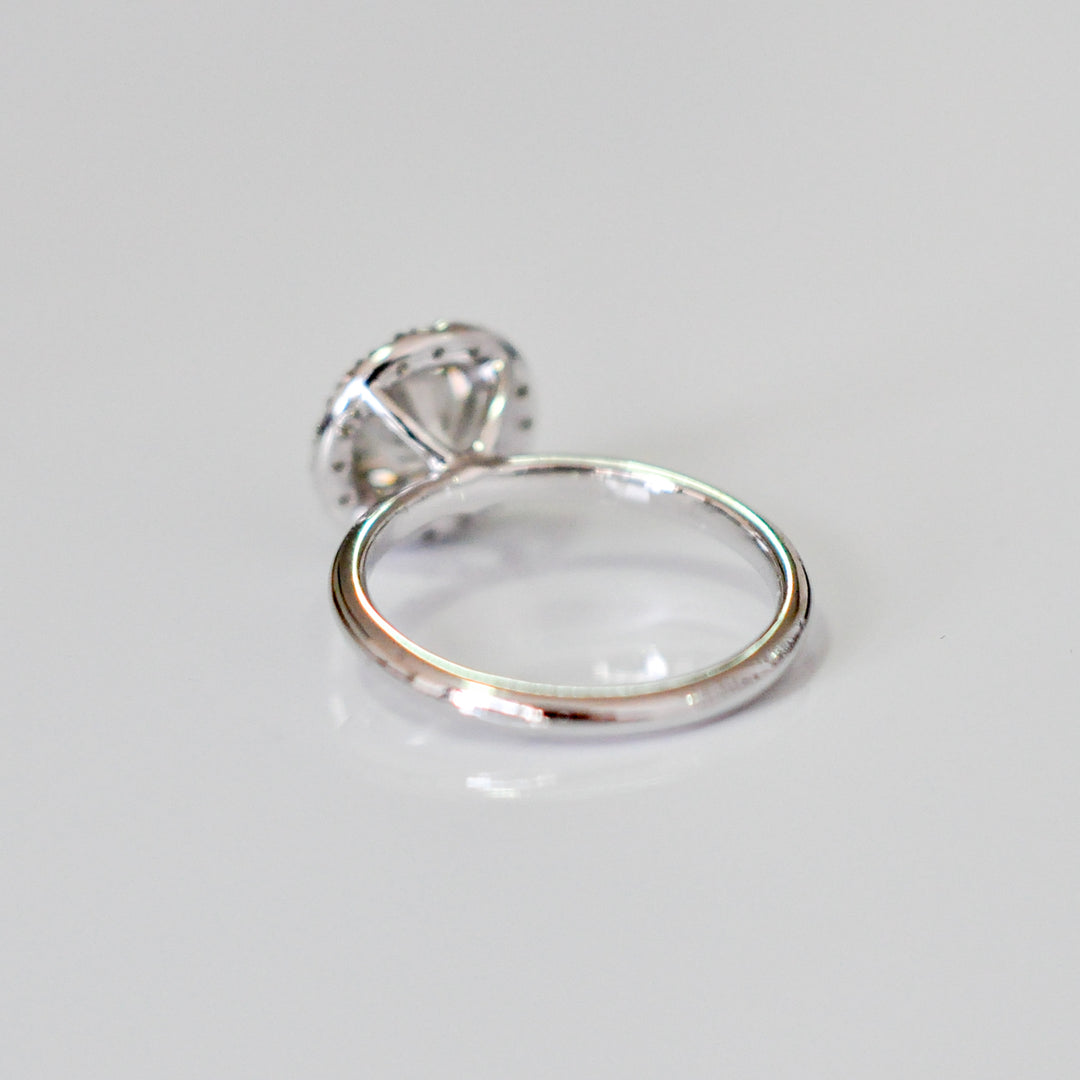 white diamonds (~1.5 ct. tw.) halo engagement ring