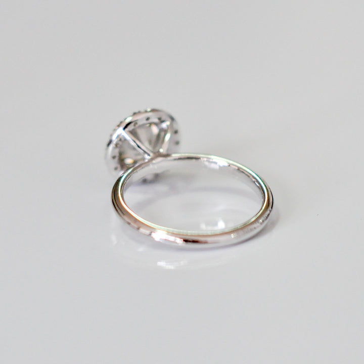 white diamonds (~1.5 ct. tw.) halo engagement ring