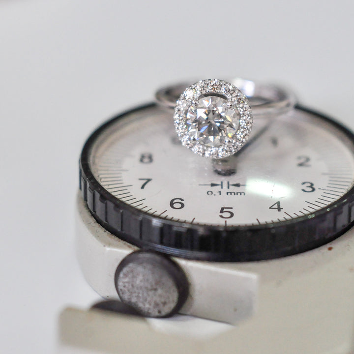 white diamonds (~1.5 ct. tw.) halo engagement ring