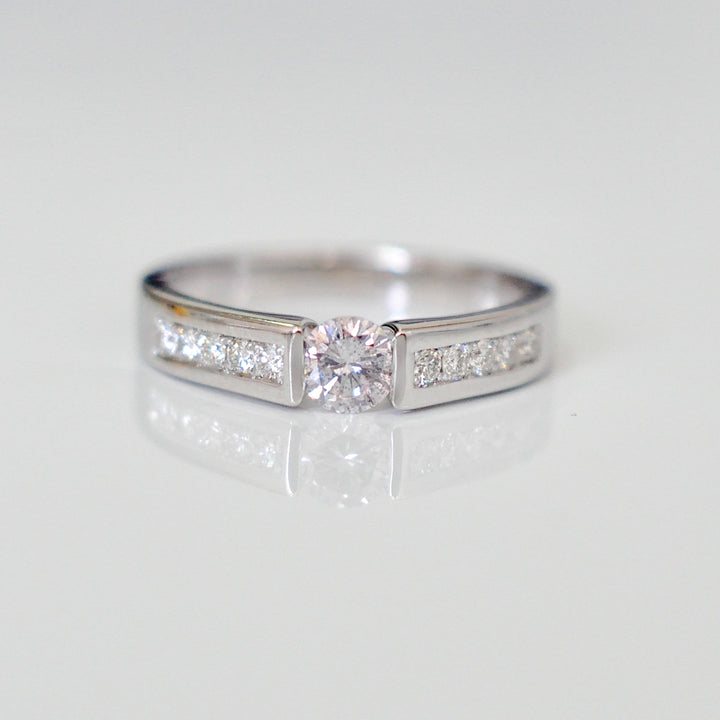 Channel Set 0.5 carat center diamond ring