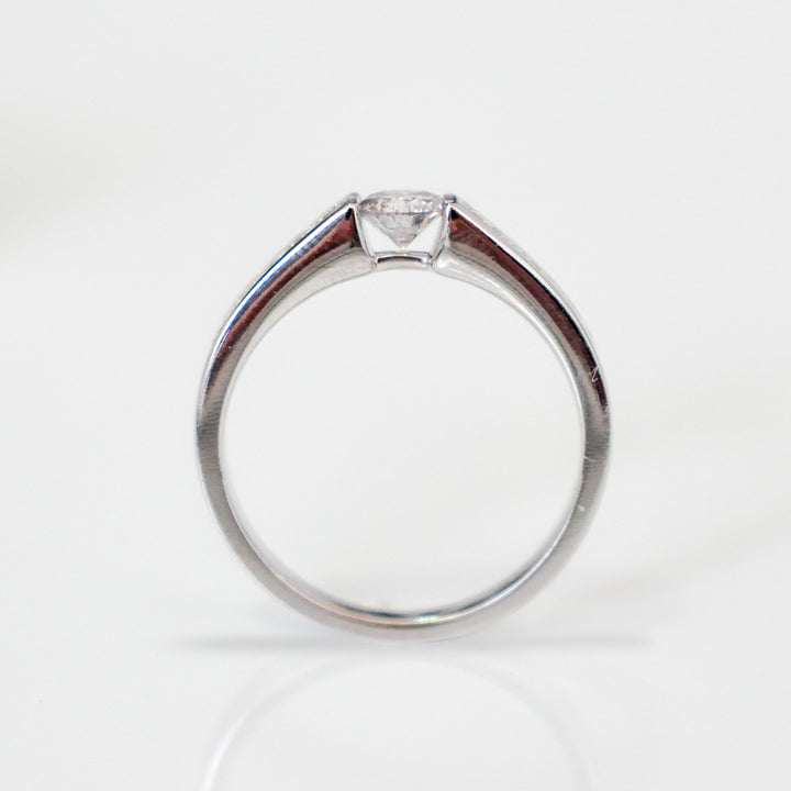 Channel Set 0.5 carat center diamond ring