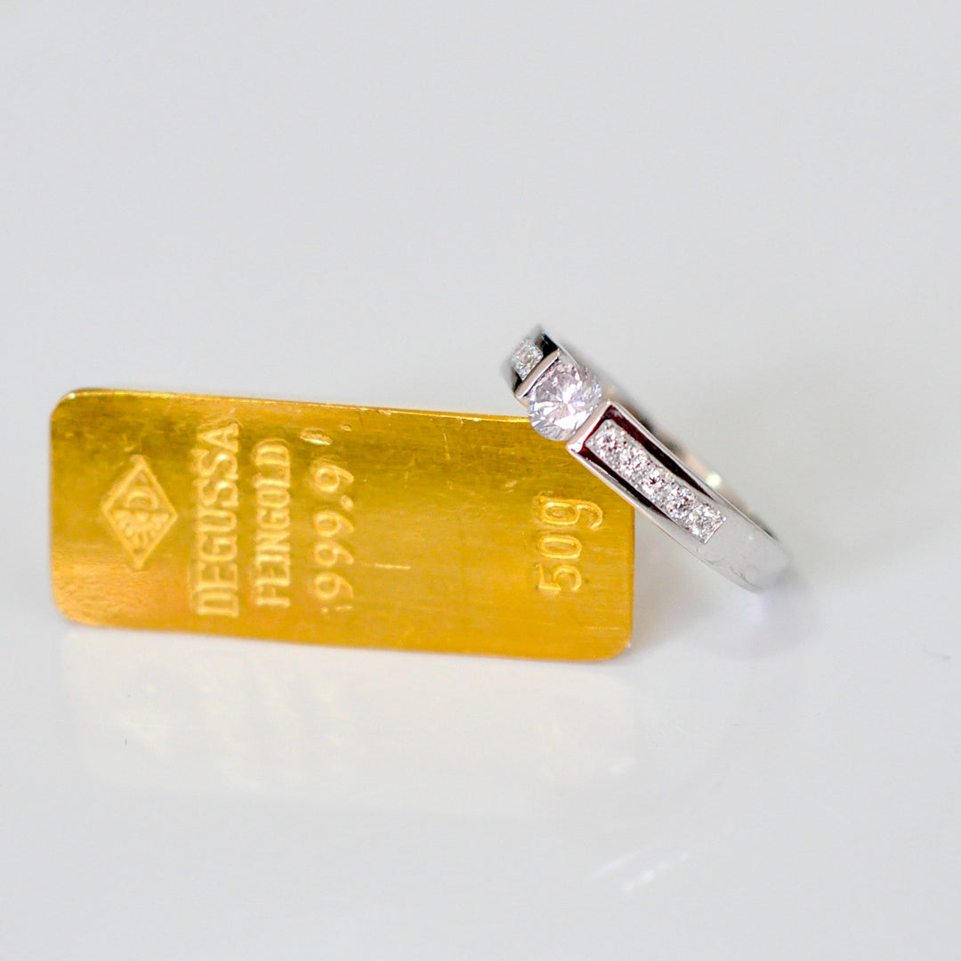 Channel Set 0.5 carat center diamond ring