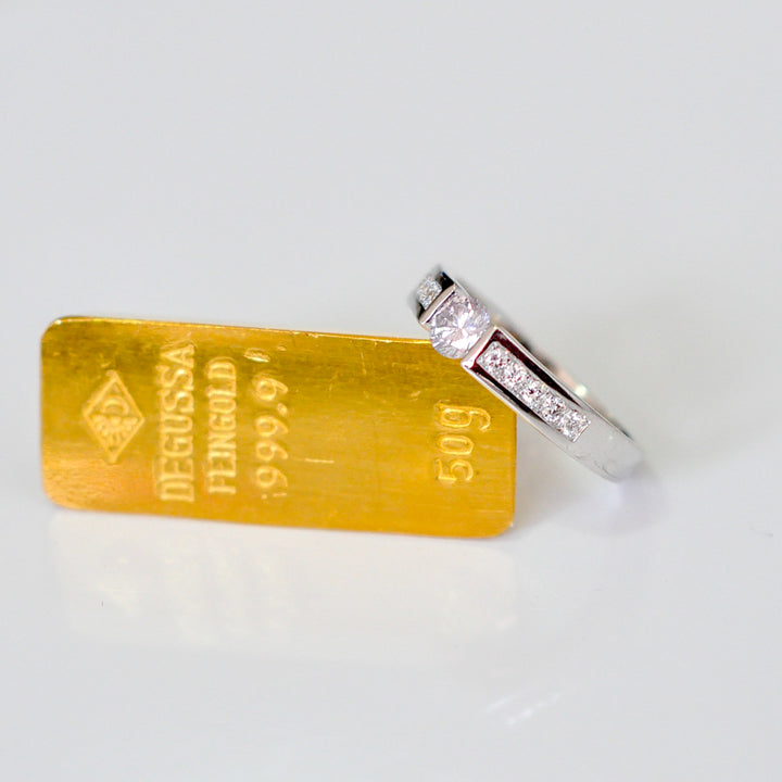 Channel Set 0.5 carat center diamond ring