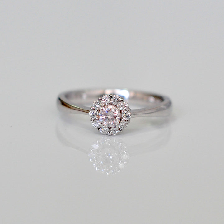 pink and white diamonds delicate halo ring