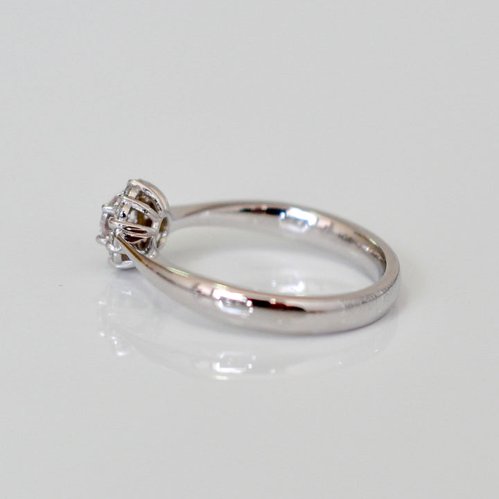 pink and white diamonds delicate halo ring