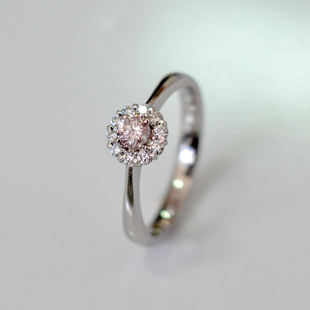 pink and white diamonds delicate halo ring