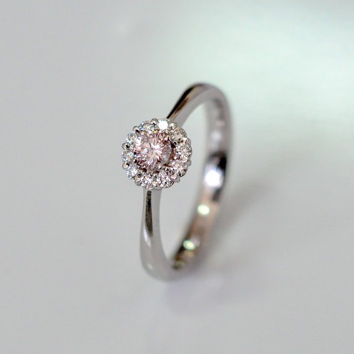pink and white diamonds delicate halo ring