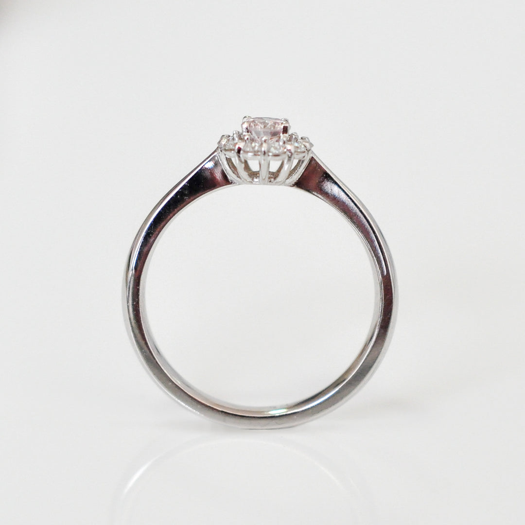pink and white diamonds delicate halo ring