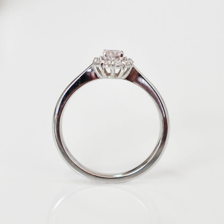 pink and white diamonds delicate halo ring
