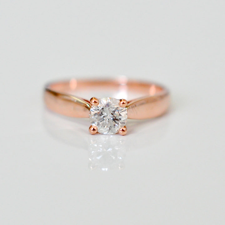 0.70 ct diamond four prongs solitaire ring
