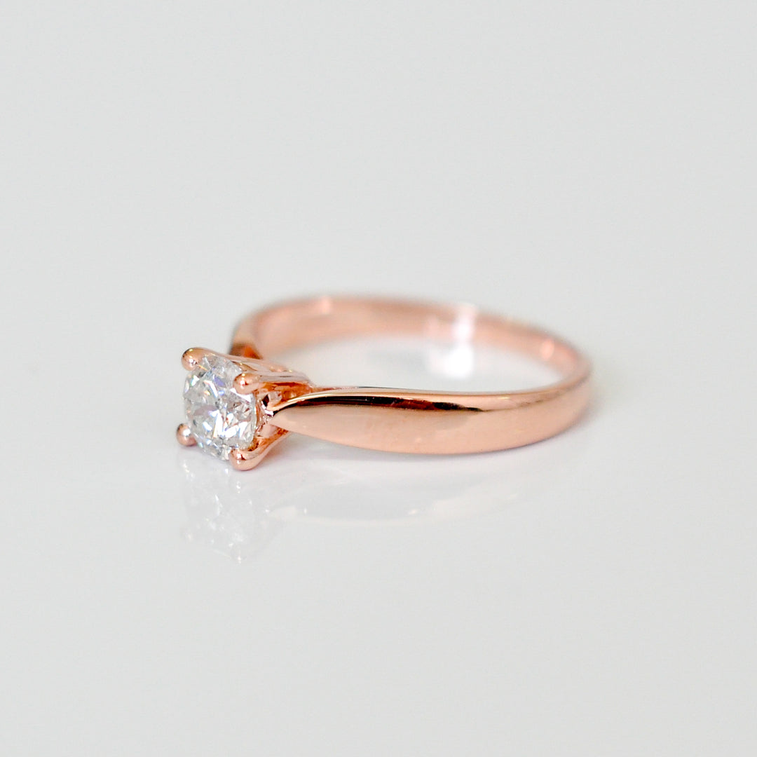 0.70 ct diamond four prongs solitaire ring