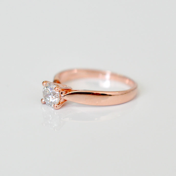 0.70 ct diamond four prongs solitaire ring