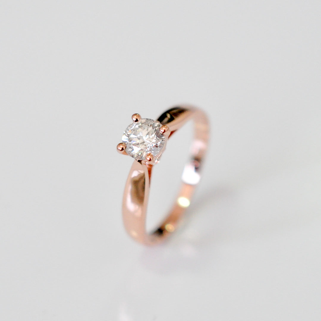 0.70 ct diamond four prongs solitaire ring