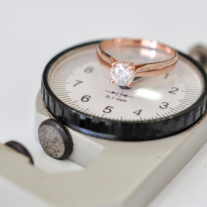 0.70 ct diamond four prongs solitaire ring