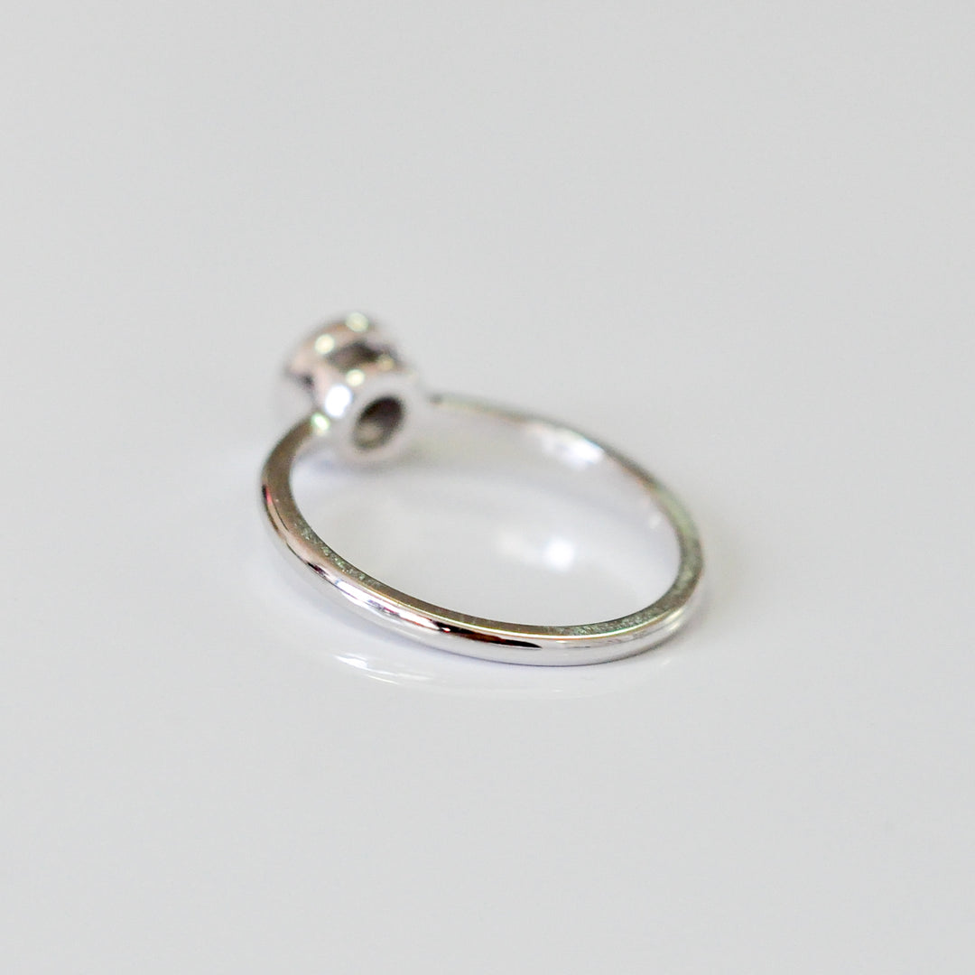delicate bezel setting 0.5 carat diamond solitaire ring