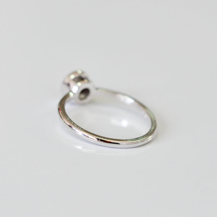 delicate bezel setting 0.5 carat diamond solitaire ring