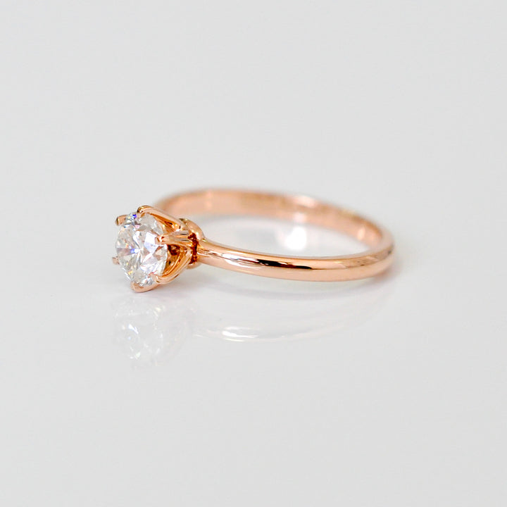 white diamond with rose gold engagement ring
