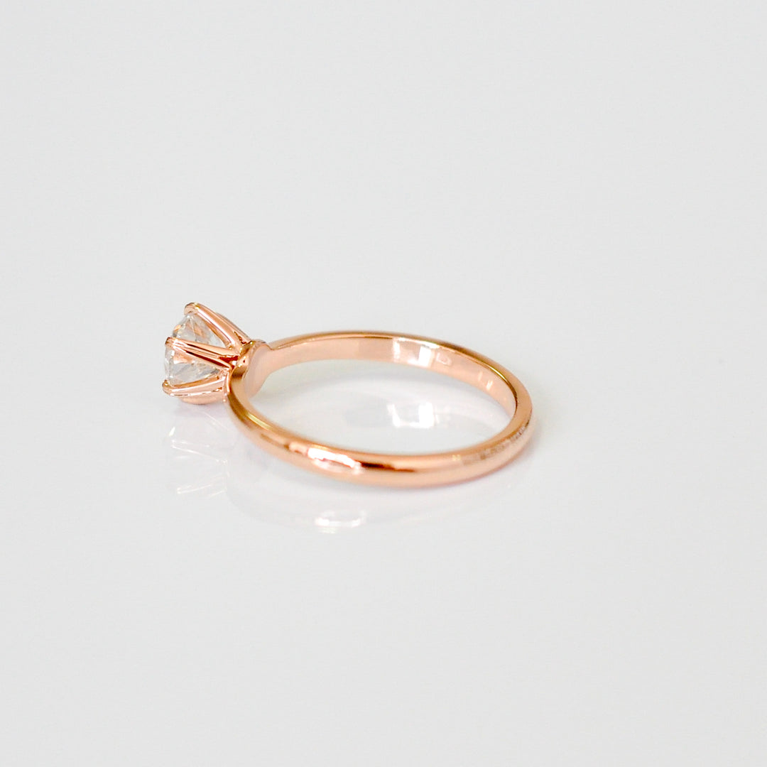 white diamond with rose gold engagement ring