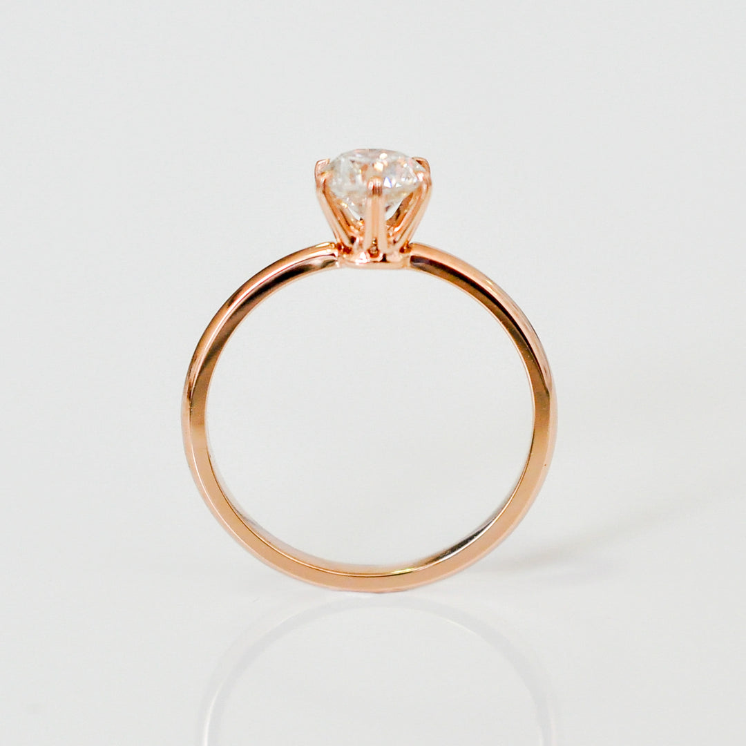 white diamond with rose gold engagement ring