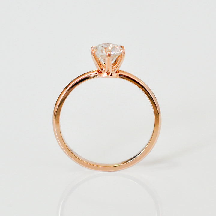 white diamond with rose gold engagement ring