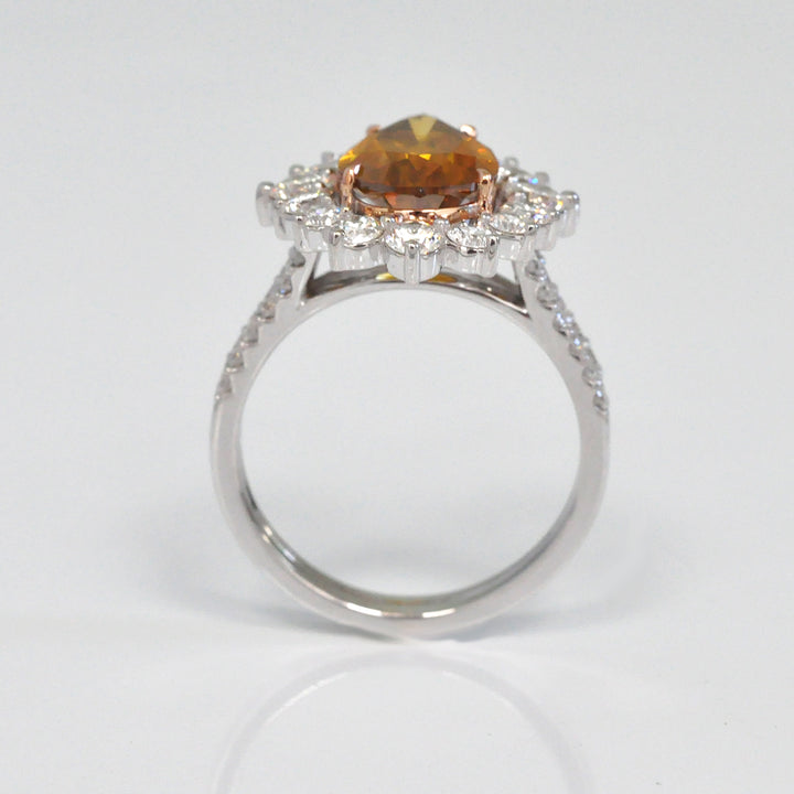 Pear shape fancy orangy brown diamond halo ring